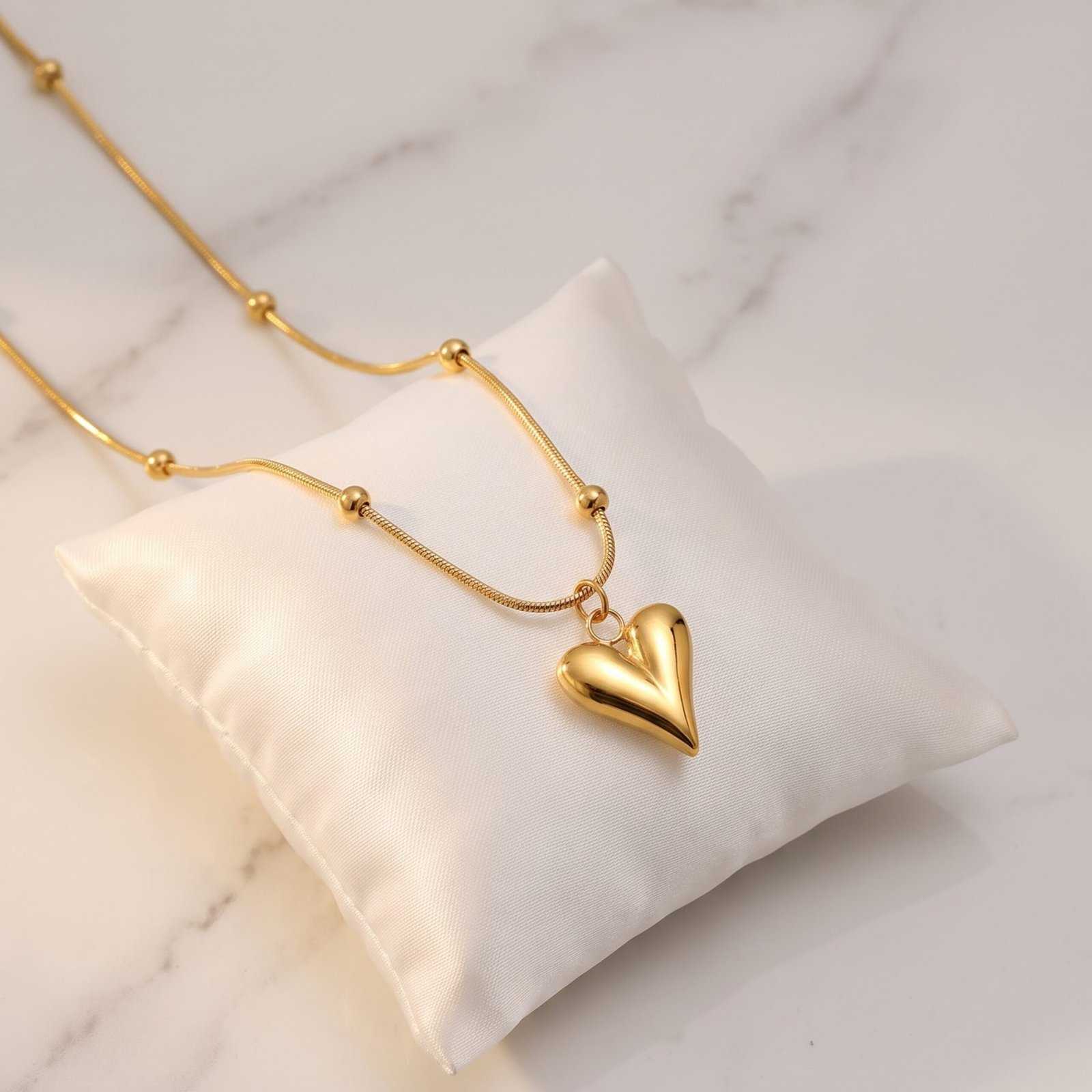 57cbe647-562f-4fa8-b8f8-bc9e8ba75098 Golden Heart Pendant Necklace with Classic Beaded Chain - Image 1